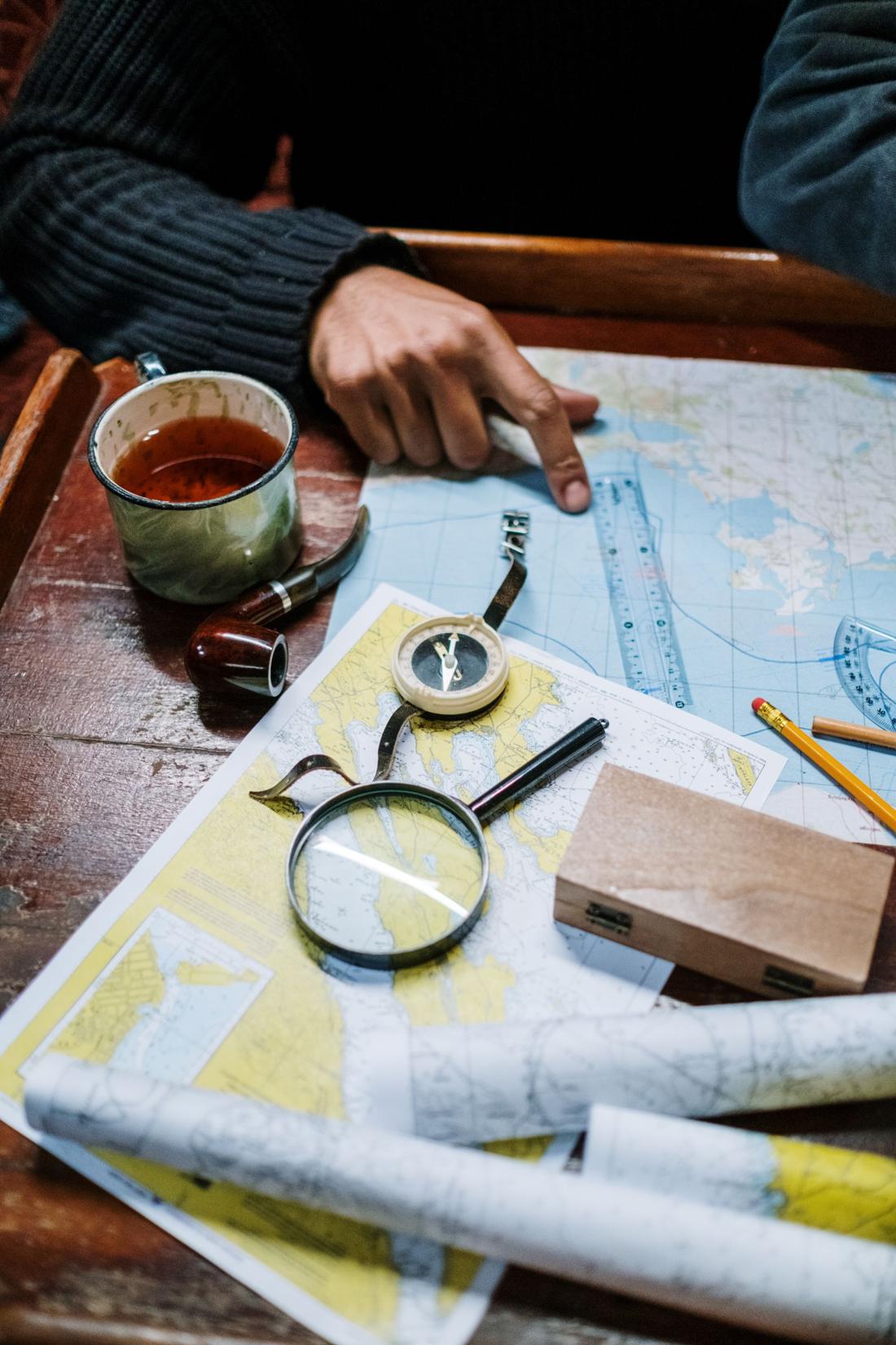 Chart, dividers and compass for passage planning